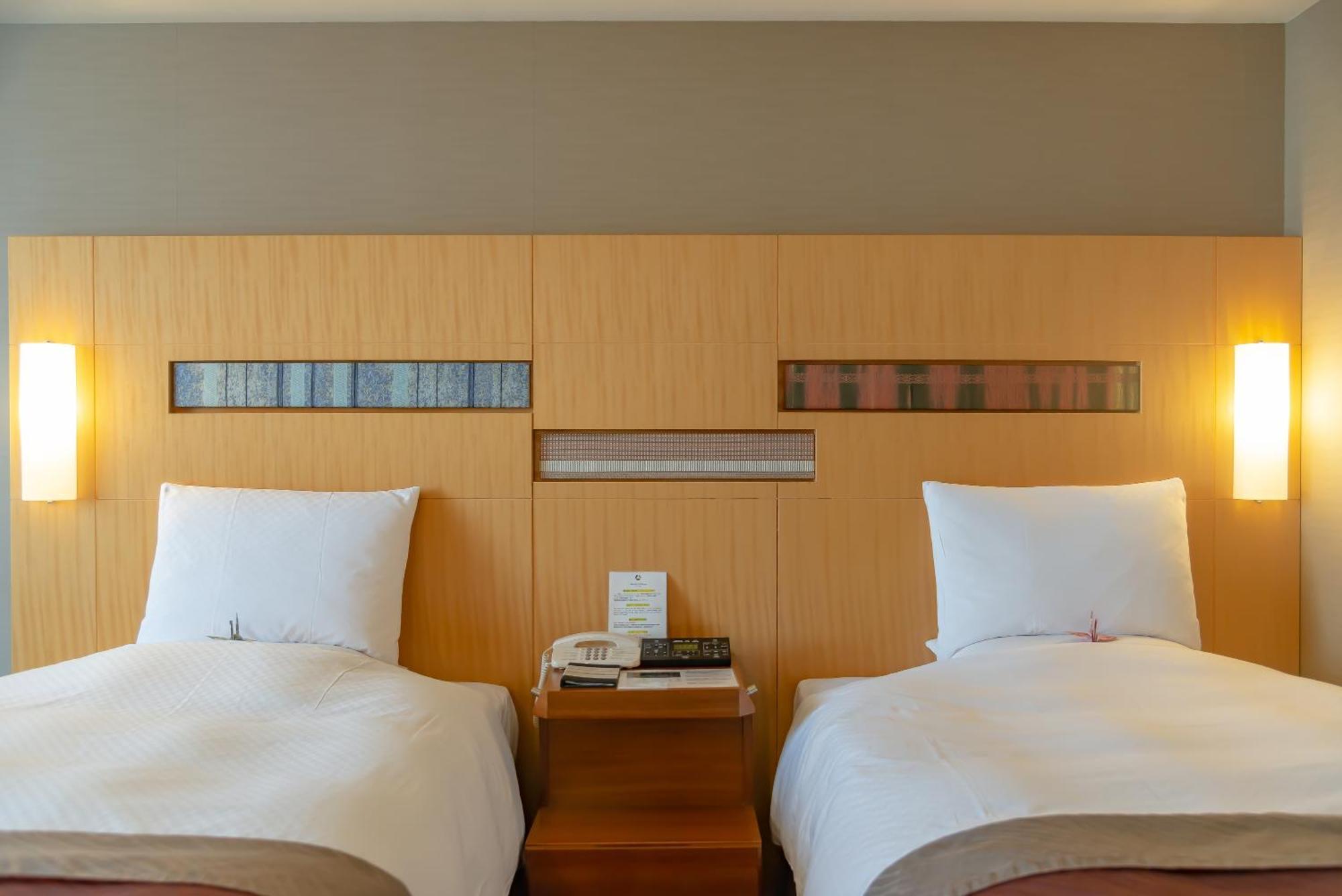 โรงแรมโอคุระ ฟูกูโอกะ ฟูกุโอกะ ห้อง รูปภาพ A room at the hotel